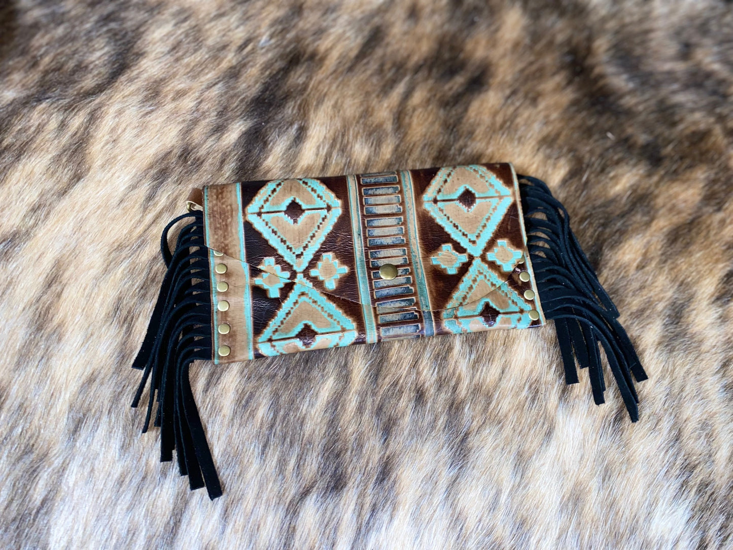 Embossed Turquoise Leather clutch