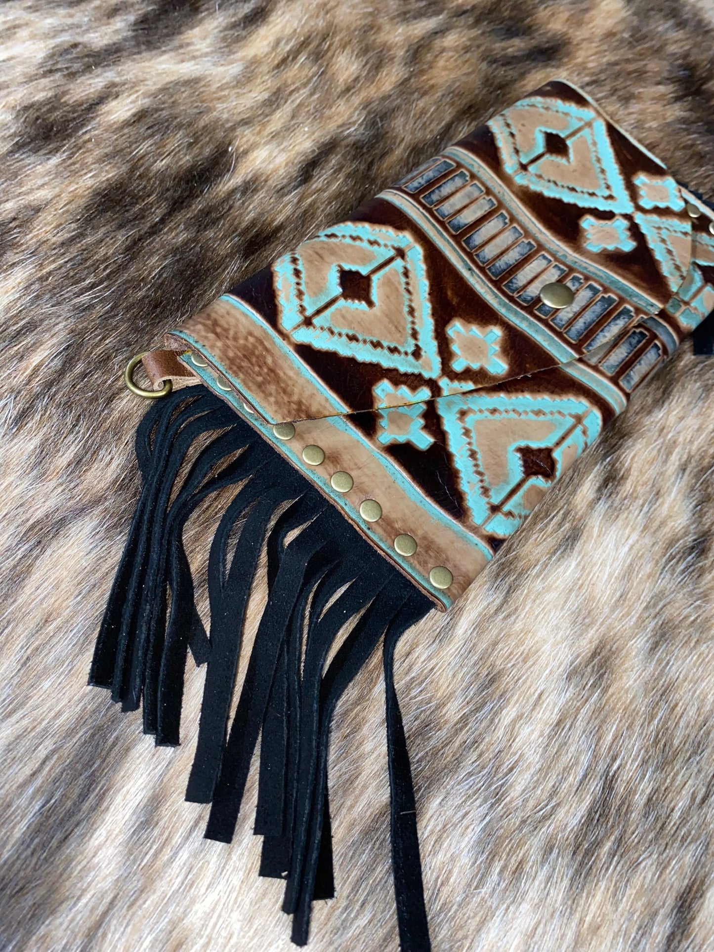 Embossed Turquoise Leather clutch